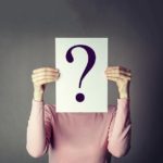 Question mark on a white sheet covering a person’s face, symbolizing inquiry or uncertainty about digital marketing and SEO services in Minneapolis.