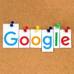 Optimized Google logo pins on corkboard representing innovative digital marketing and SEO solutions from One Dog Solutions in Minneapolis.